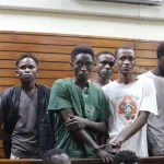 185 alleged protestors arraigned in court as police claim they vandalized and looted property.